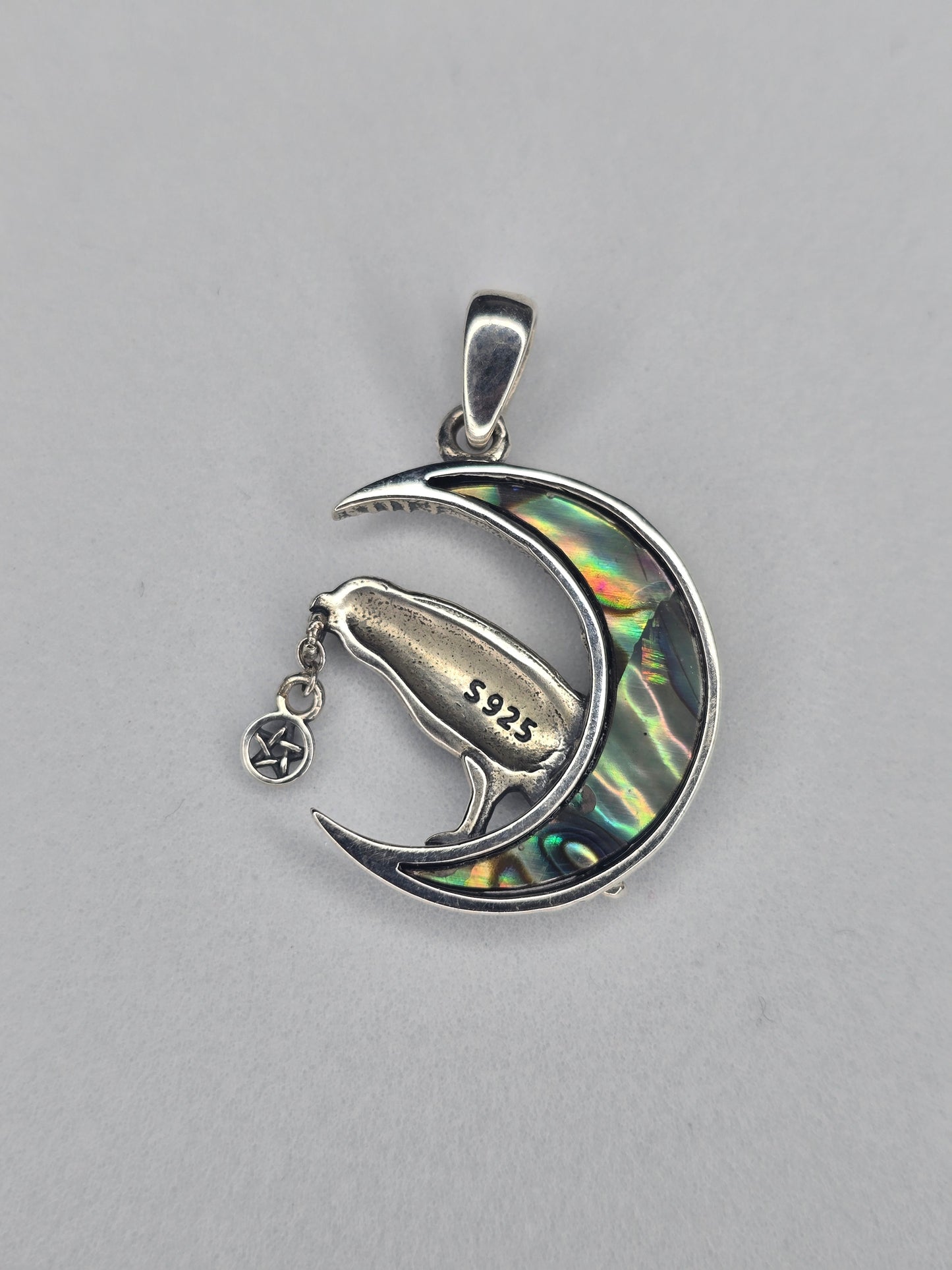 Back view of Viking raven moon pendant in 925 sterling silver showing S925 hallmark and abalone inlay