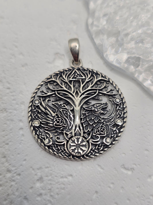 Honor ancient lore and powerful symbols with the Viking Raven Wolf Yggdrasil Pendant, crafted in solid 925 sterling silver. Centered on Yggdrasil—the Norse Tree of Life—this design unites the raven (wisdom, knowledge) and the wolf (strength, guardianship) around interlacing motifs, celebrating connection, courage, and timeless heritage.

Wear it as a daily talisman or gift it to a lover of Norse mythology—crisp engraving and a polished finish give this piece a striking, meaningful presence.

Key Features:

