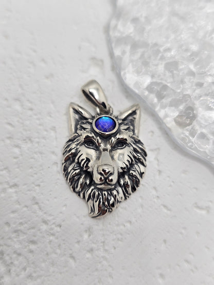 Channel strength, intuition, and lunar guidance with the Moonstone Wolf King Pendant, crafted in solid 925 sterling silver. A noble wolf head is rendered in fine detail, crowned with a luminous moonstone at the brow—symbol of insight, protection, and the rhythms of the moon.

Wear it as a daily talisman of leadership and courage, or gift it to someone who walks with the spirit of the wolf. Balanced proportions and crisp detailing give this piece a powerful, elegant presence.

Key Features:

Made from solid 