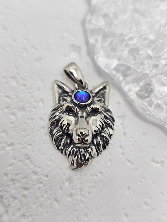 Channel strength, intuition, and lunar guidance with the Moonstone Wolf King Pendant, crafted in solid 925 sterling silver. A noble wolf head is rendered in fine detail, crowned with a luminous moonstone at the brow—symbol of insight, protection, and the rhythms of the moon.

Wear it as a daily talisman of leadership and courage, or gift it to someone who walks with the spirit of the wolf. Balanced proportions and crisp detailing give this piece a powerful, elegant presence.

Key Features:

Made from solid 
