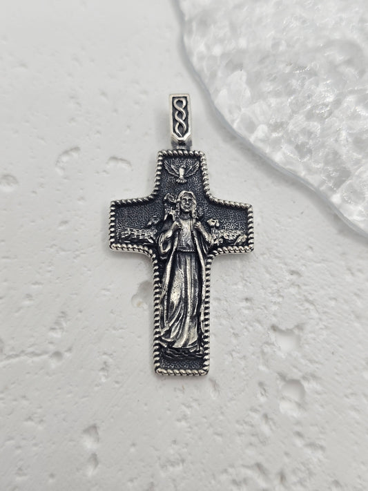 Jesus Crucifix with Holy Spirit Symbolism in Precious Metal
A meaningful symbol of faith and peace, this Jesus Crucifix pendant is crafted in 925 sterling silver with a polished finish. Above the corpus, a dove signifies the Holy Spirit, adding a message of hope and protection to this timeless devotional piece.

Design & Symbolism

    Dove of the Holy Spirit: Poised above the figure of Christ, representing peace and divine presence.

    Detailed Corpus & Cross: Symbolizes sacrifice, love, and redemption.
