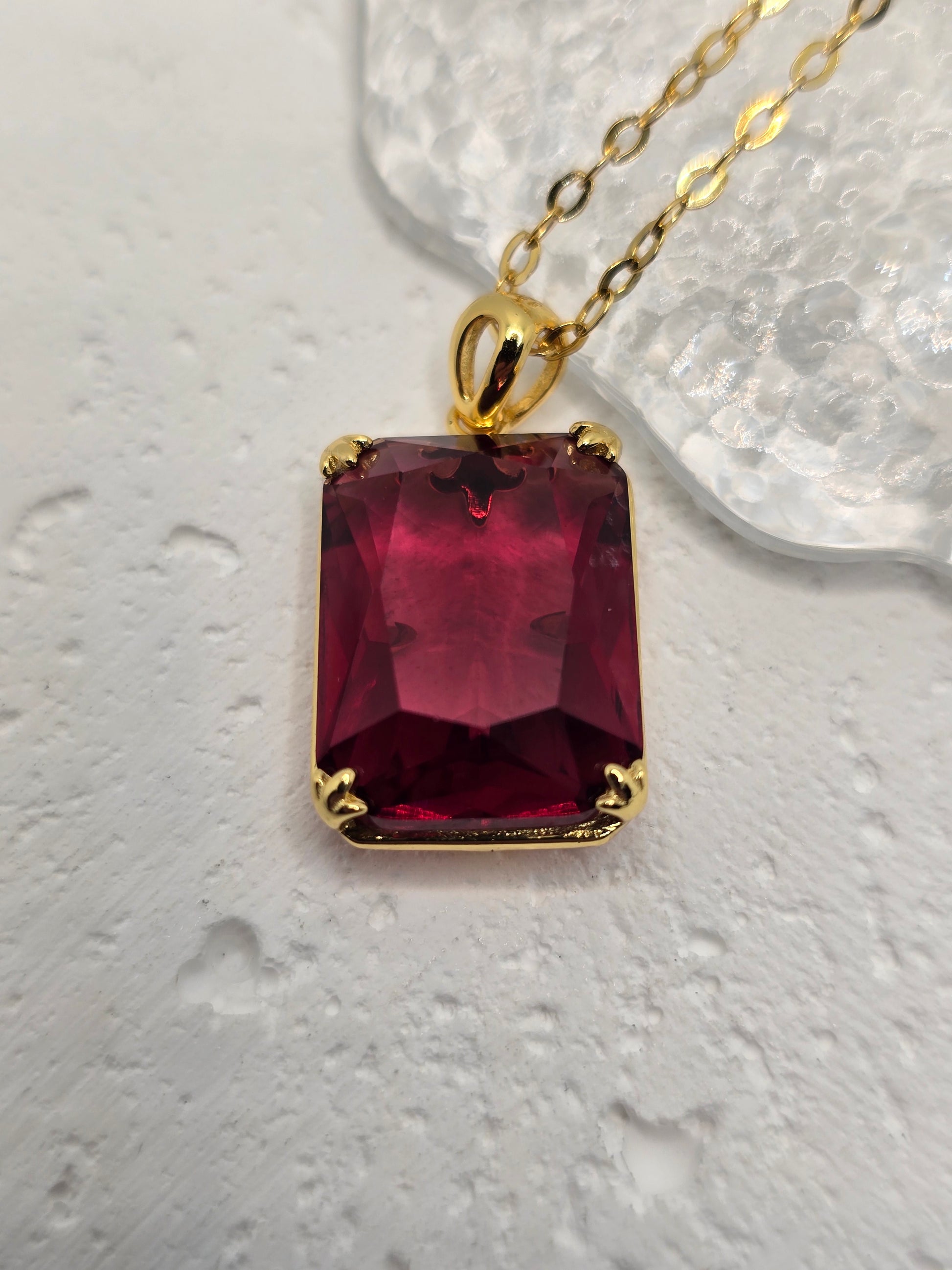 Bring bold, Nordic-inspired style to your look with this Ruby Viking Pendant, crafted in luminous 925 sterling silver with refined 14K gold accents—complete with a 45 cm sterling silver chain. A vivid ruby centre delivers rich crimson brilliance, while VVS-grade clear stones (CZ) add crisp sparkle around the setting. Compact yet eye-catching, it’s a standout gift for birthdays, anniversaries, or weddings.

Key Features

Made from premium 925 Sterling Silver with 14K gold accents
Centre ruby for deep, fiery 