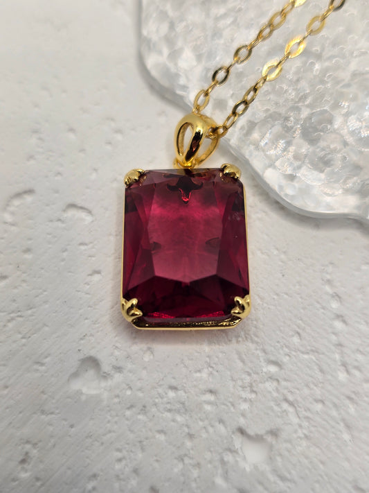 Bring bold, Nordic-inspired style to your look with this Ruby Viking Pendant, crafted in luminous 925 sterling silver with refined 14K gold accents—complete with a 45 cm sterling silver chain. A vivid ruby centre delivers rich crimson brilliance, while VVS-grade clear stones (CZ) add crisp sparkle around the setting. Compact yet eye-catching, it’s a standout gift for birthdays, anniversaries, or weddings.

Key Features

Made from premium 925 Sterling Silver with 14K gold accents
Centre ruby for deep, fiery 
