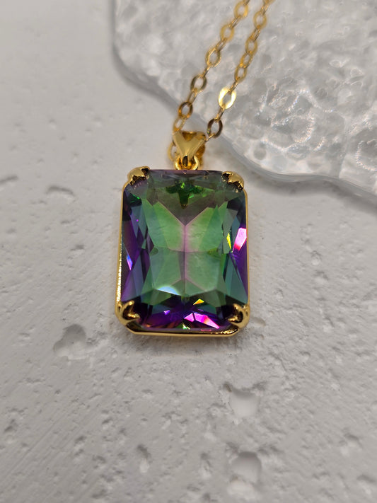 Key Features

Made from premium 925 Sterling Silver with 14K gold accents
Centre mystic topaz for prismatic, colour-changing brilliance
VVS-grade clear stones (CZ) for extra shimmer
Includes 45 cm sterling silver chain—ready to wear
Viking-inspired detailing; elegant, durable polish