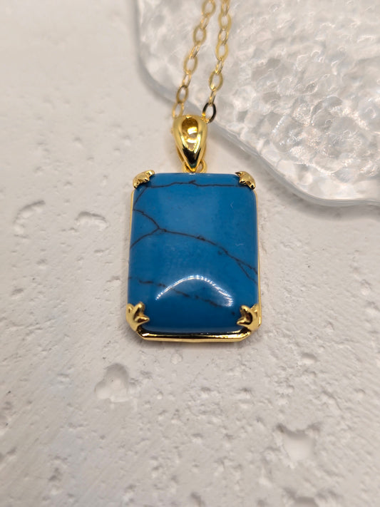 Bring bold, Nordic-inspired style to your look with this Turquoise Viking Pendant, crafted in luminous 925 sterling silver with refined 14K gold accents—complete with a 45 cm sterling silver chain. A vivid turquoise centre adds cool blue-green character and timeless charm, while VVS-grade clear stones (CZ) deliver crisp sparkle around the setting. Compact yet eye-catching, it’s a standout gift for birthdays, anniversaries, or weddings.

Key Features

Made from premium 925 Sterling Silver with 14K gold accen