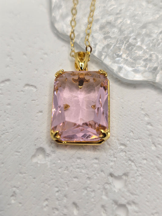 Bring bold, Nordic-inspired style to your look with this Pink Topaz Viking Pendant, crafted in luminous 925 sterling silver with refined 14K gold accents—complete with a 45 cm sterling silver chain. A vibrant pink topaz centre adds rosy brilliance and charm, while VVS-grade clear stones (CZ) deliver crisp sparkle around the setting. Compact yet eye-catching, it’s a standout gift for birthdays, anniversaries, or weddings.

Key Features

Made from premium 925 Sterling Silver with 14K gold accents
Centre pink 