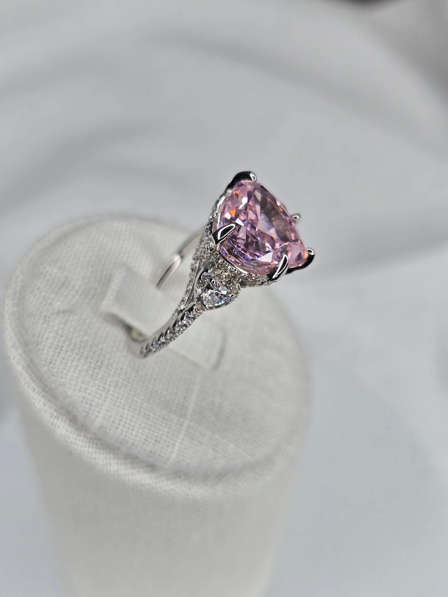 Rear view of raised prong setting heart moissanite silver ring