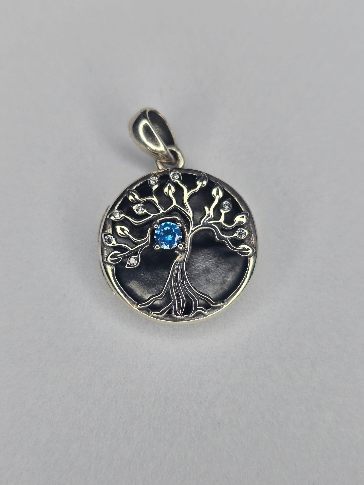 Tree of Life photo locket in 925 sterling silver with blue zircon centre