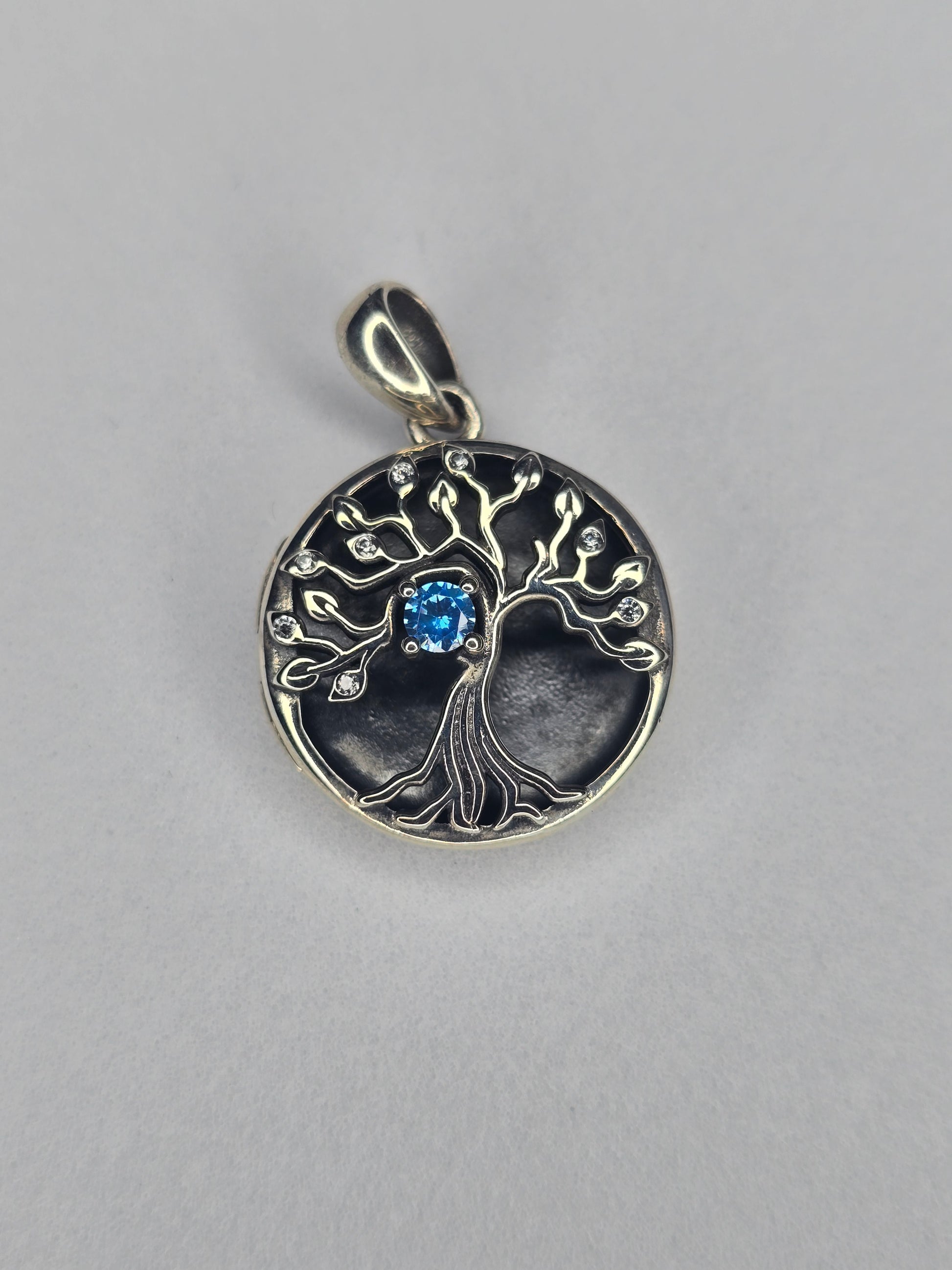 Tree of Life photo locket in 925 sterling silver with blue zircon centre