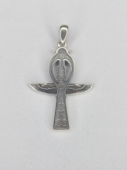 Back view of sterling silver Ankh cross amulet with textured finish and wing design