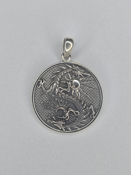 Sun and moon dragon amulet in solid 925 sterling silver with detailed mythical engraving