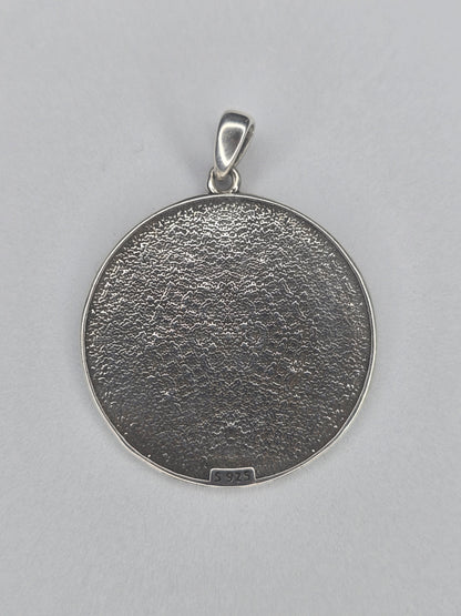Back view of Seven Archangels sterling silver pendant with textured finish and 925 hallmark
