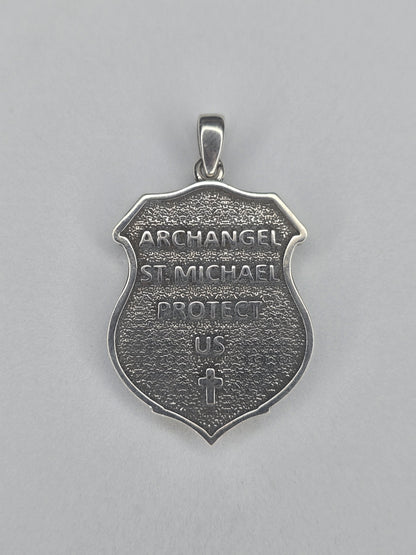 Back view of Saint Michael shield amulet with engraved Archangel inscription