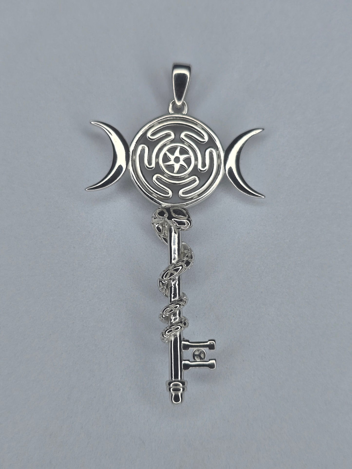 Hekate wheel pendant in 925 sterling silver with snake and triple moon symbol