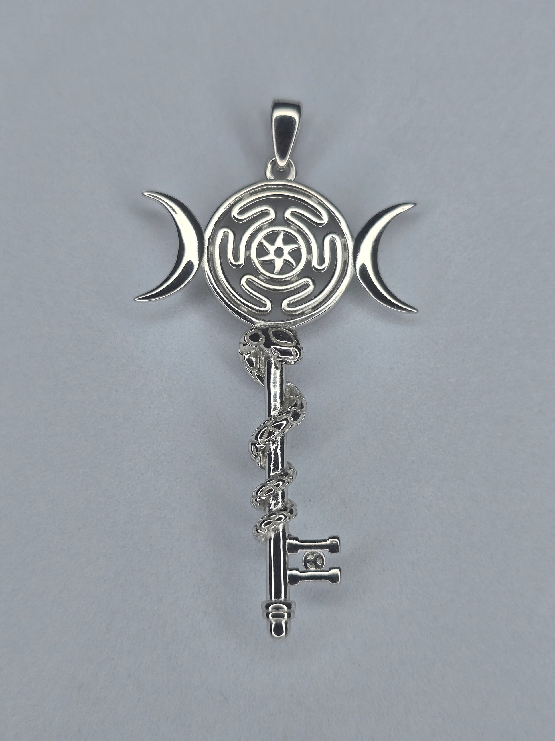 Hekate wheel pendant in 925 sterling silver with snake and triple moon symbol