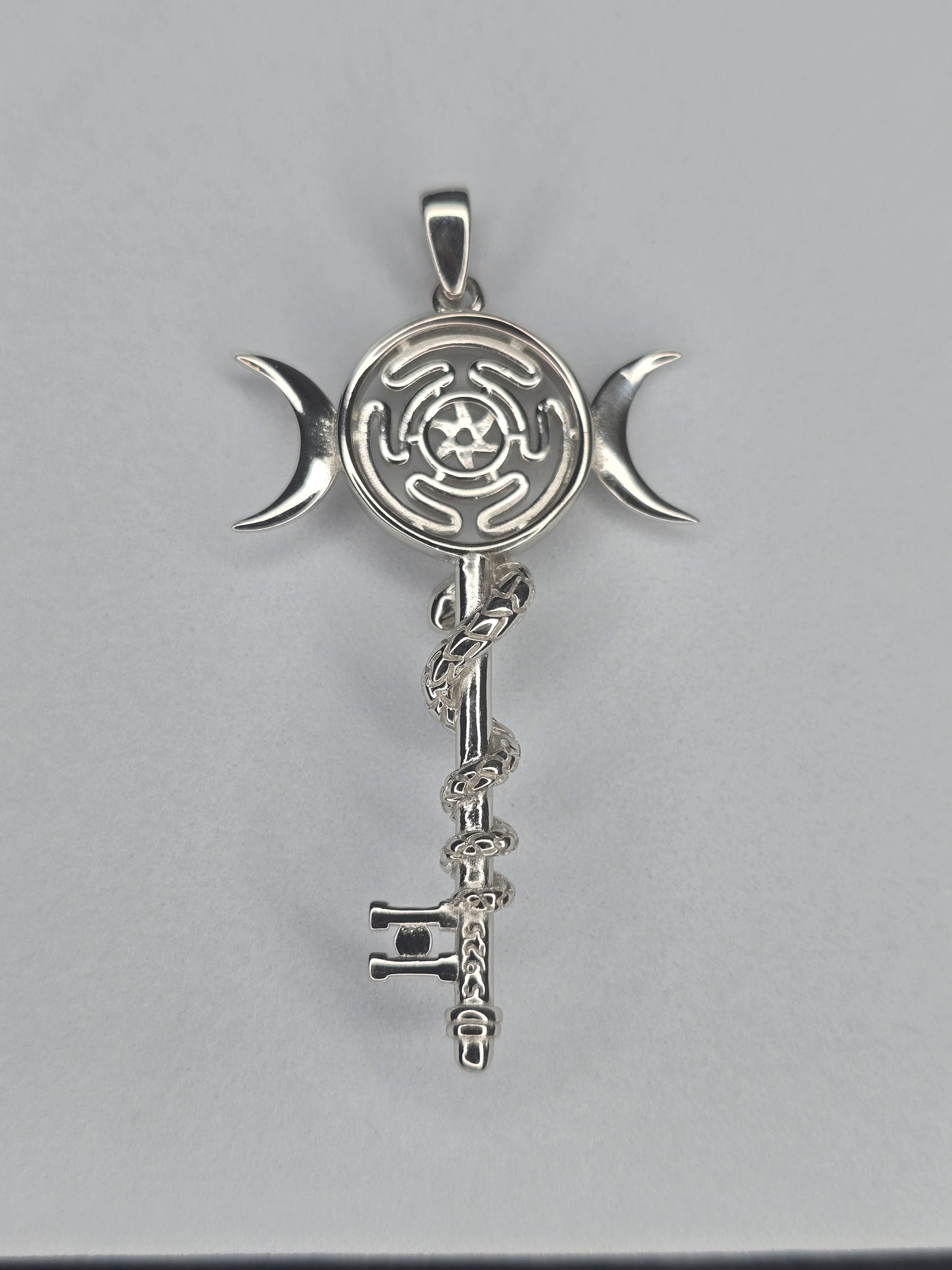 Rear view of Hekate wheel snake key pendant in sterling silver