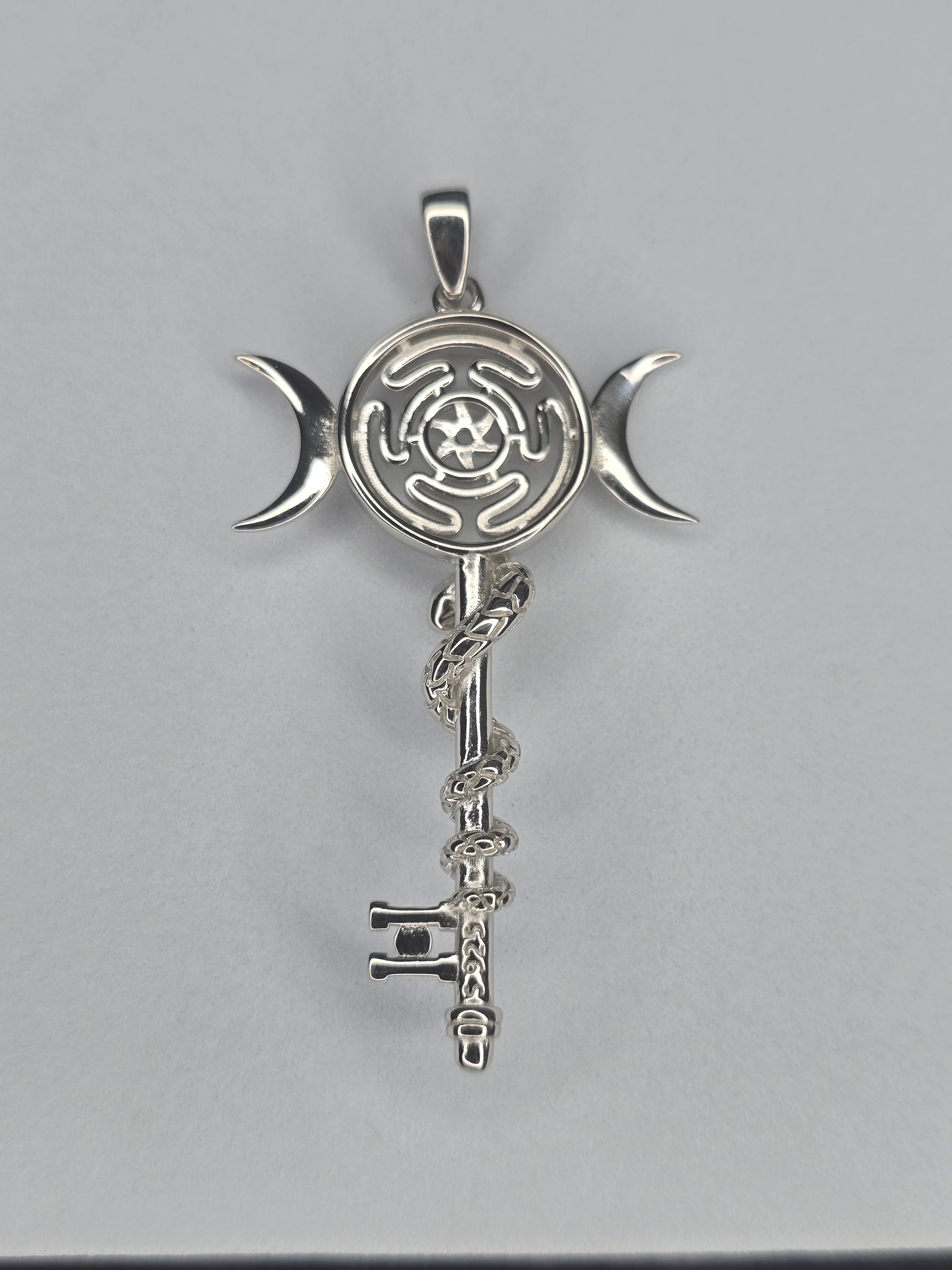 Rear view of Hekate wheel snake key pendant in sterling silver