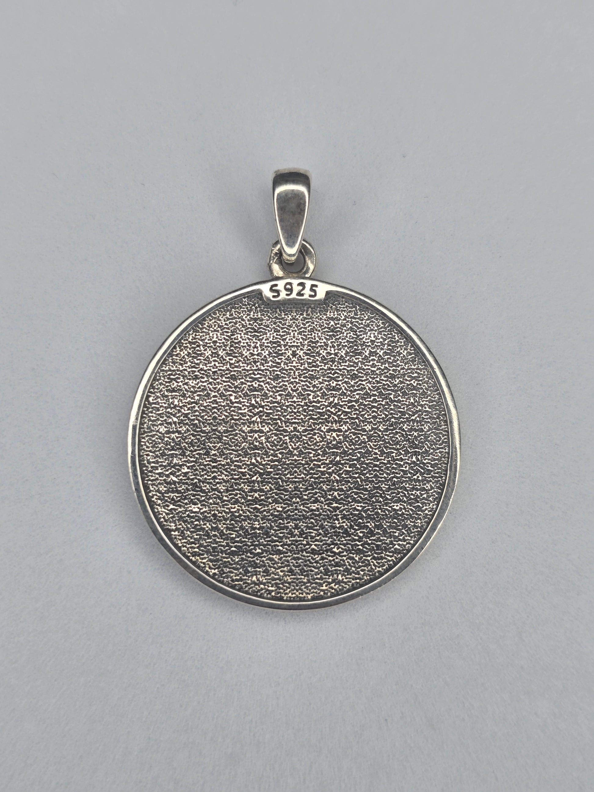 Back view of Hecate pagan pendant with textured sterling silver finish