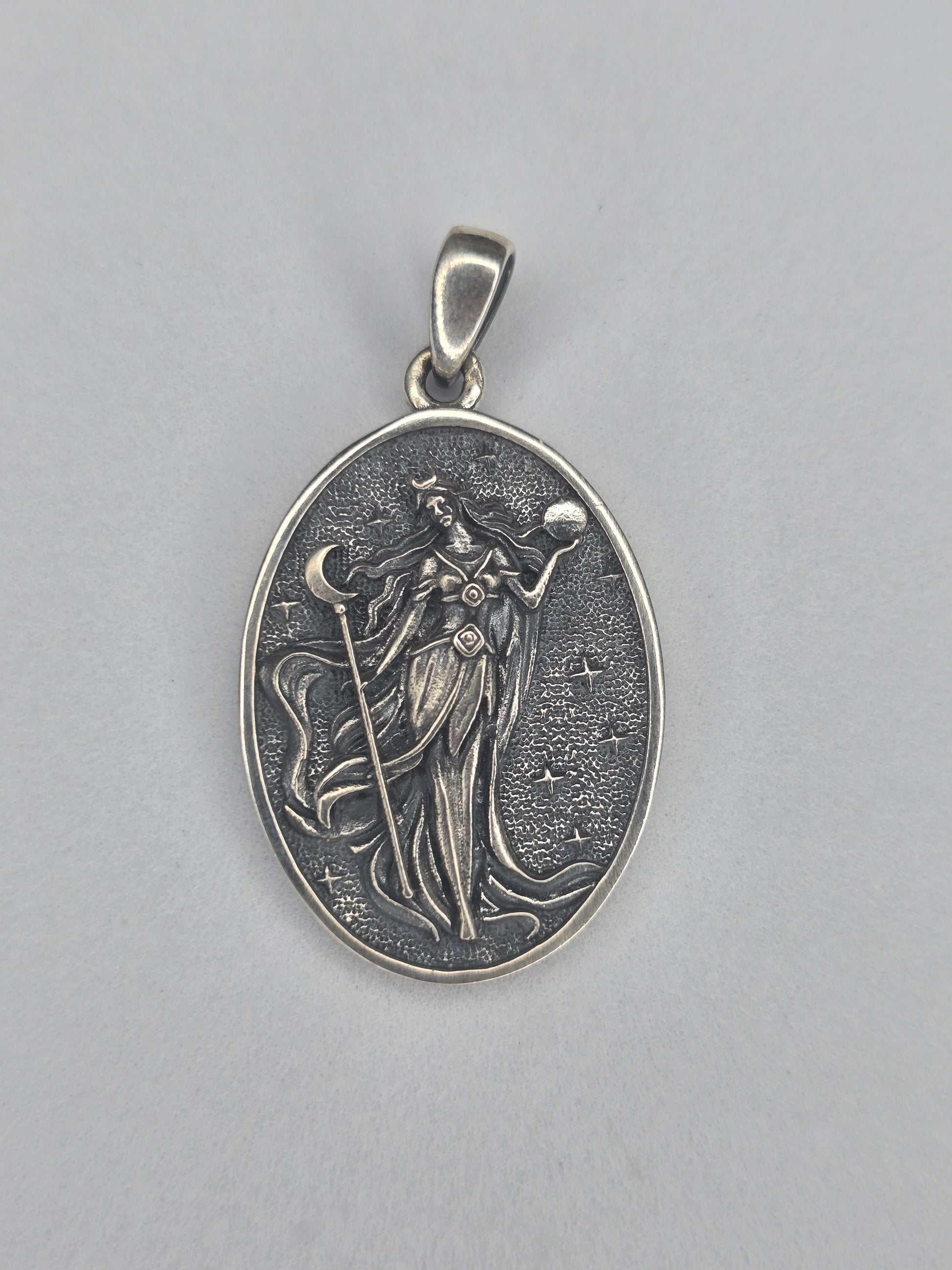 Nyx moon goddess pendant in 925 sterling silver with lunar symbols