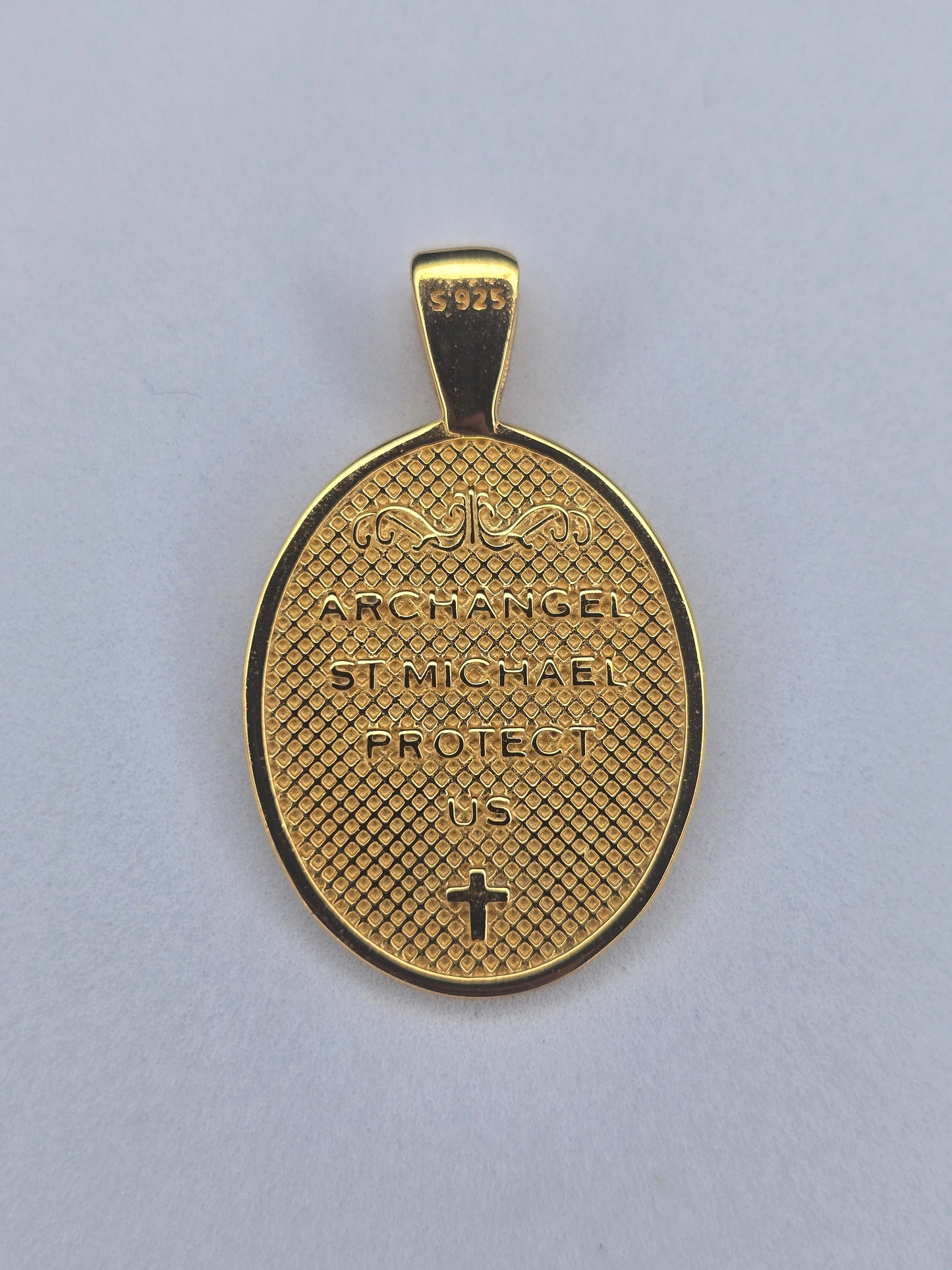 Back view of Saint Michael protection medal with Archangel Saint Michael Protect Us engraving