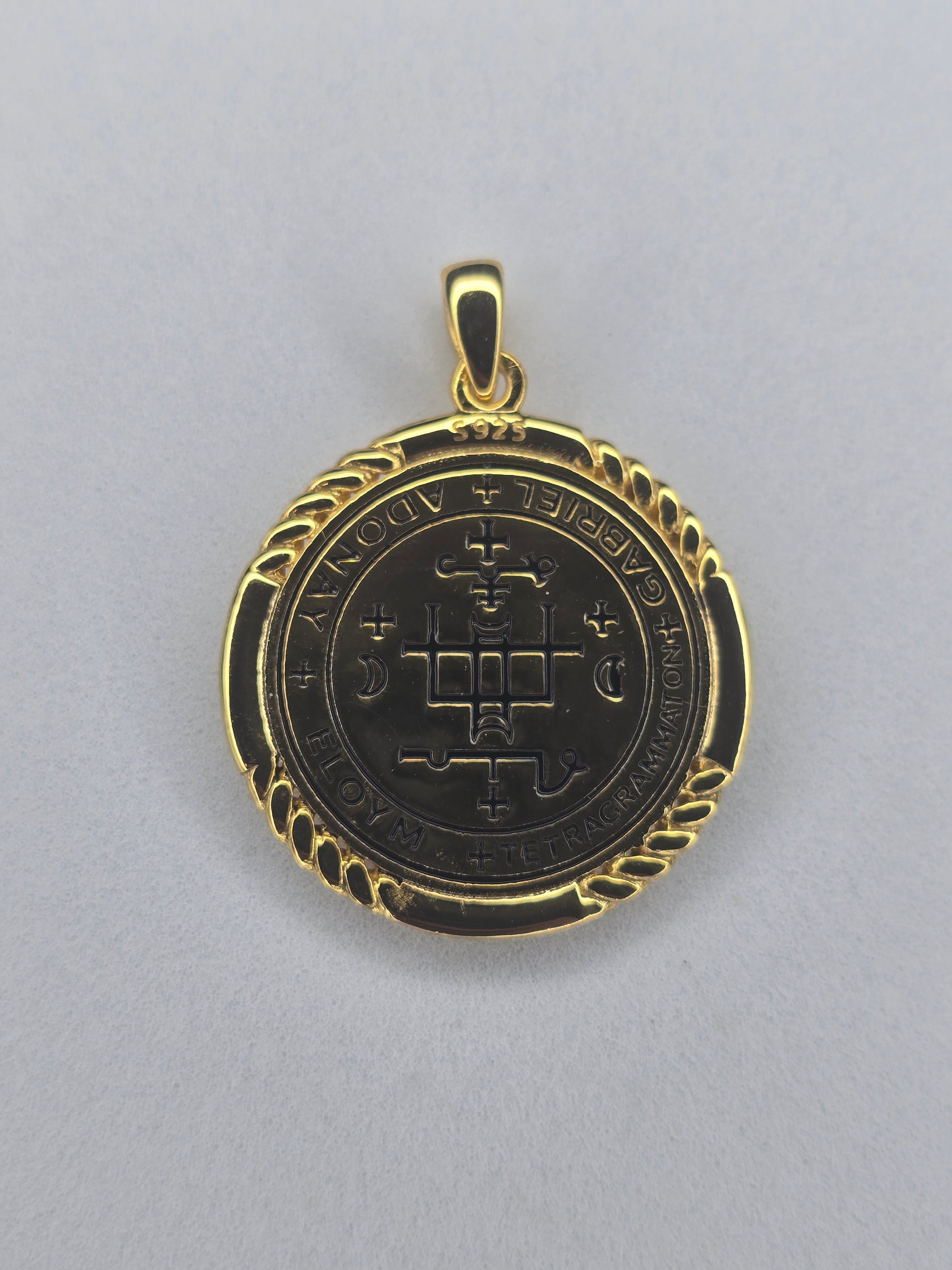 Back view of Saint Gabriel medal with engraved angelic seal and sacred symbols
