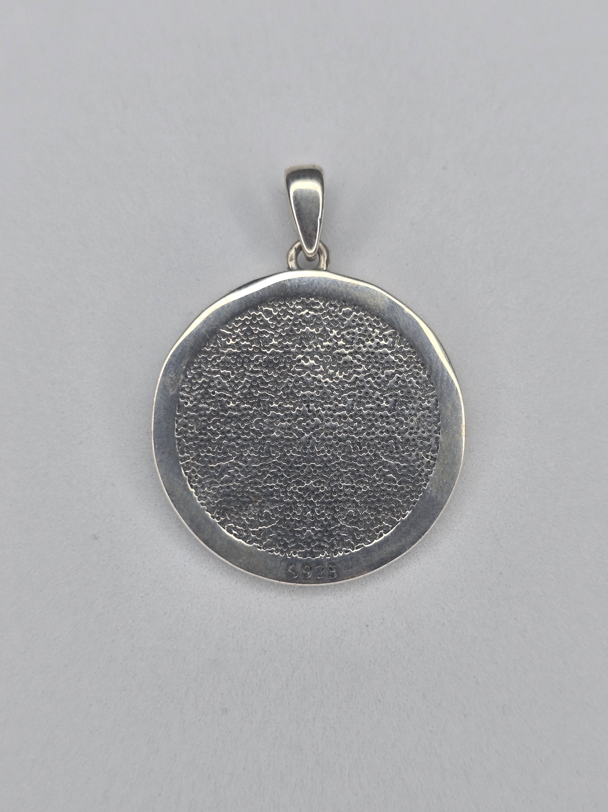 Back view of sterling silver Ankh pendant with textured circular finish and 925 hallmark