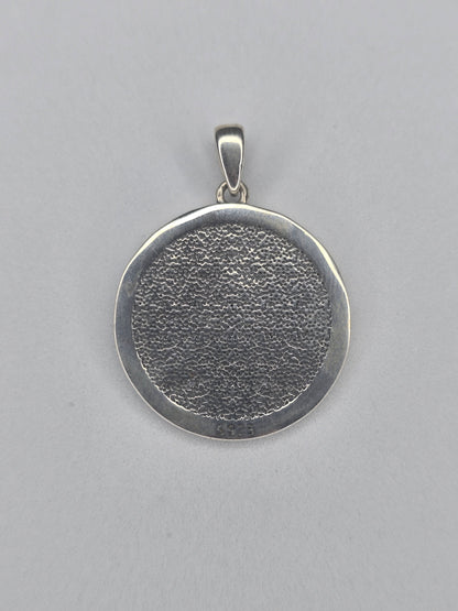 Back view of sterling silver Ankh pendant with textured circular finish and 925 hallmark