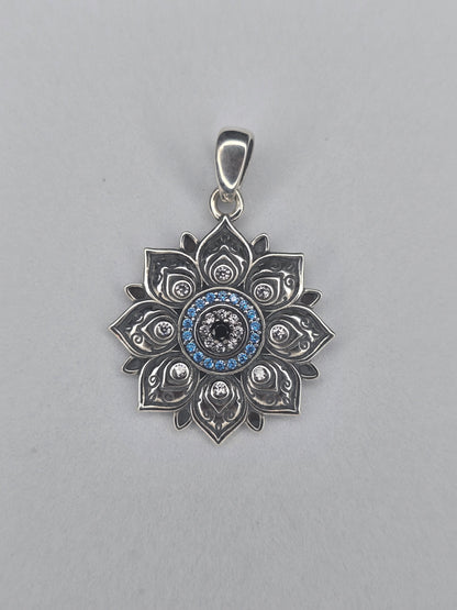 Lotus evil eye pendant in solid 925 sterling silver with blue stones and central protective eye
