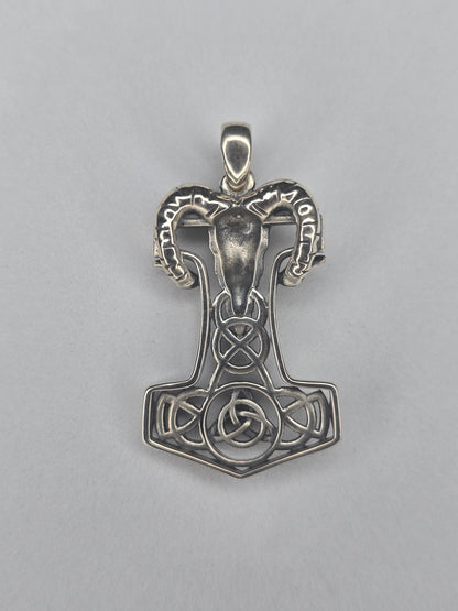 Back view of sterling silver Mjolnir pendant with openwork knot design and textured finish