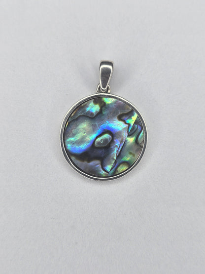 Back view of round abalone shell pendant set in 925 sterling silver