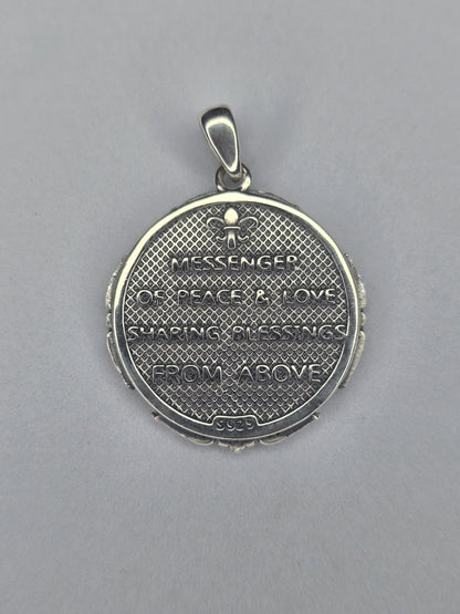 Back view of Saint Gabriel medal with Messenger of Peace and Love engraving