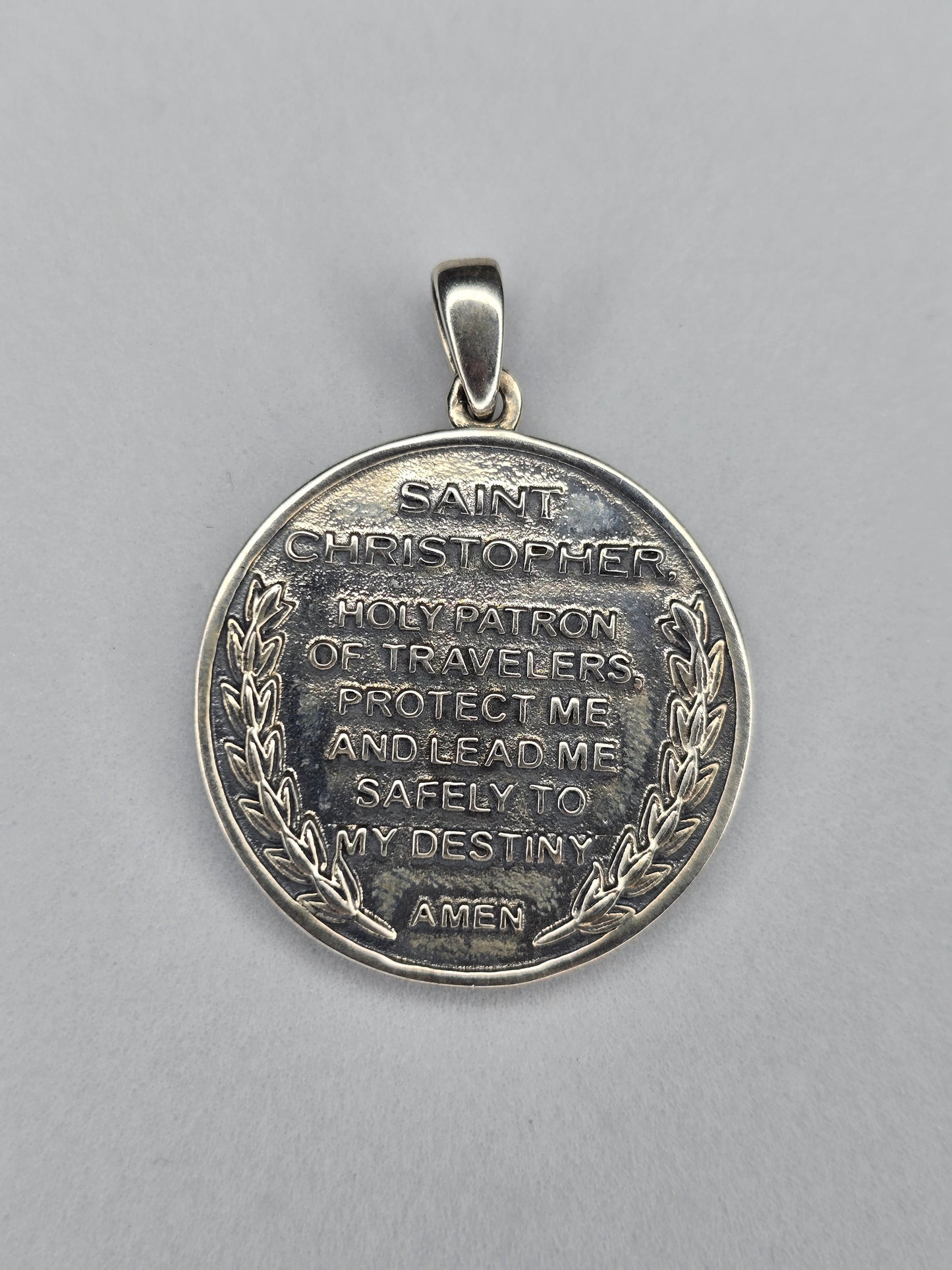 Back view of Saint Christopher medallion with engraved prayer in sterling silver