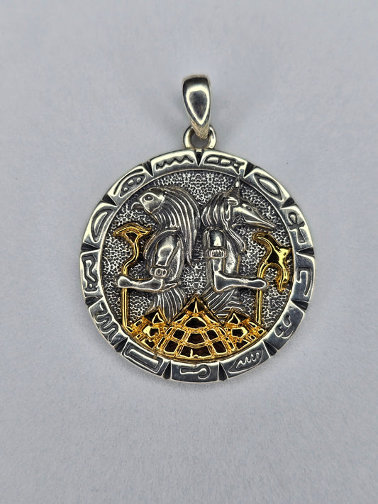 Anubis pendant in solid 925 sterling silver with Egyptian hieroglyph border and gold-tone pyramid detail