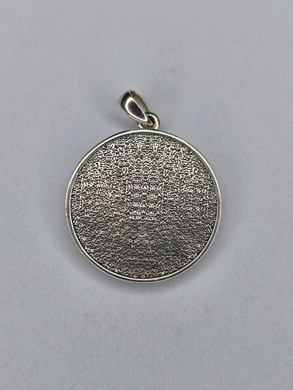 Back view of Anubis amulet with textured sterling silver surface