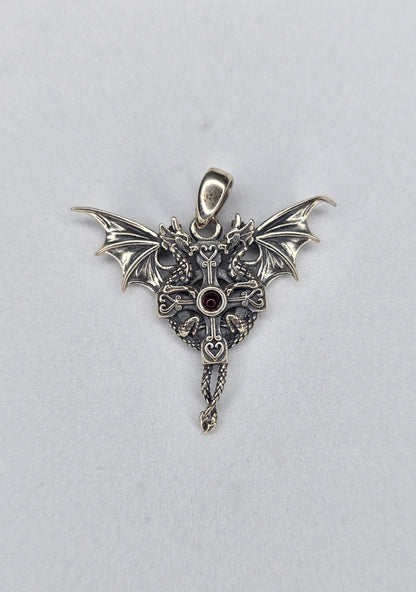 Twin dragon cross pendant in 925 sterling silver with central round red stone front view