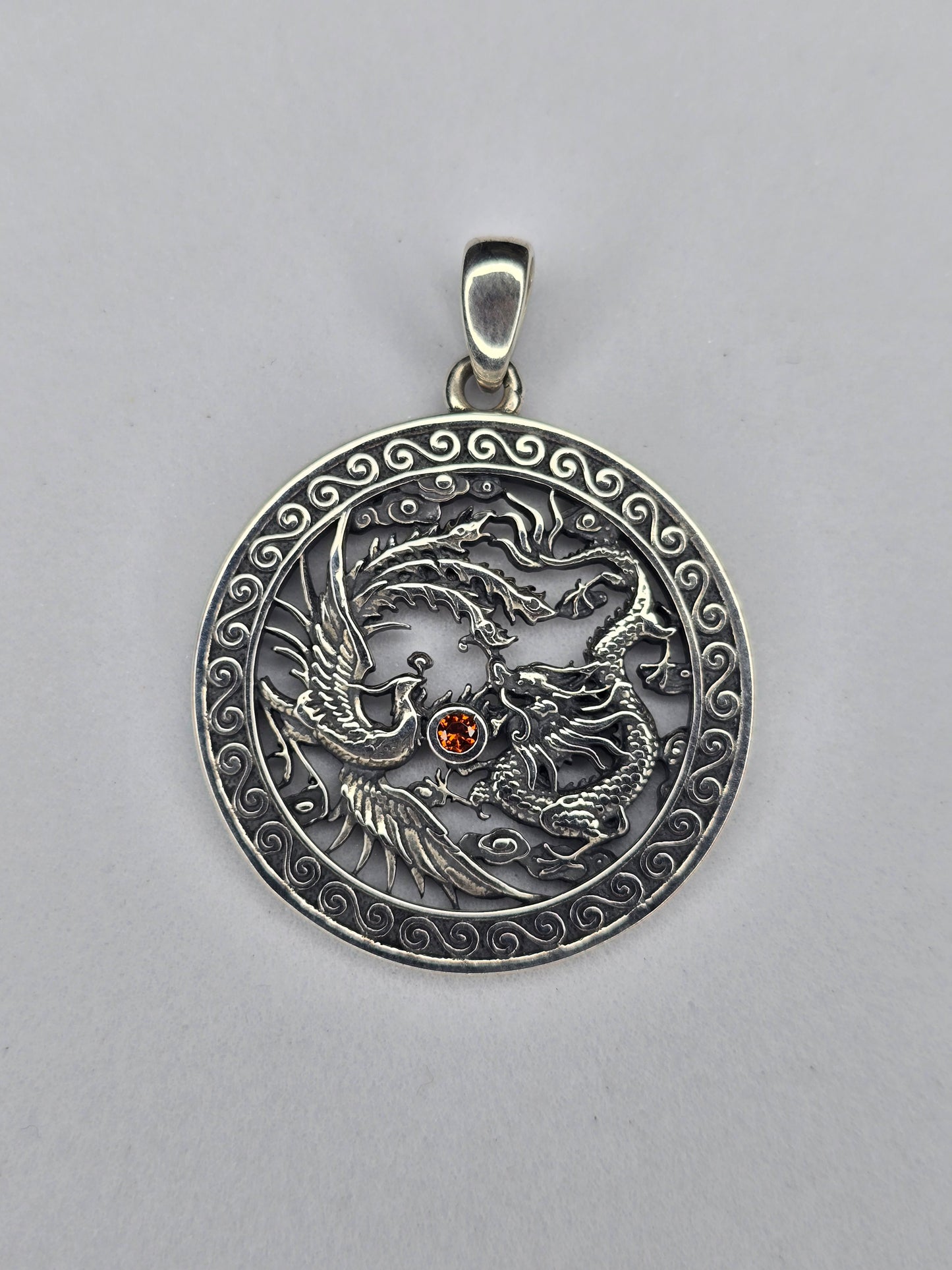 Phoenix and dragon yin yang pendant in 925 sterling silver with ruby centre