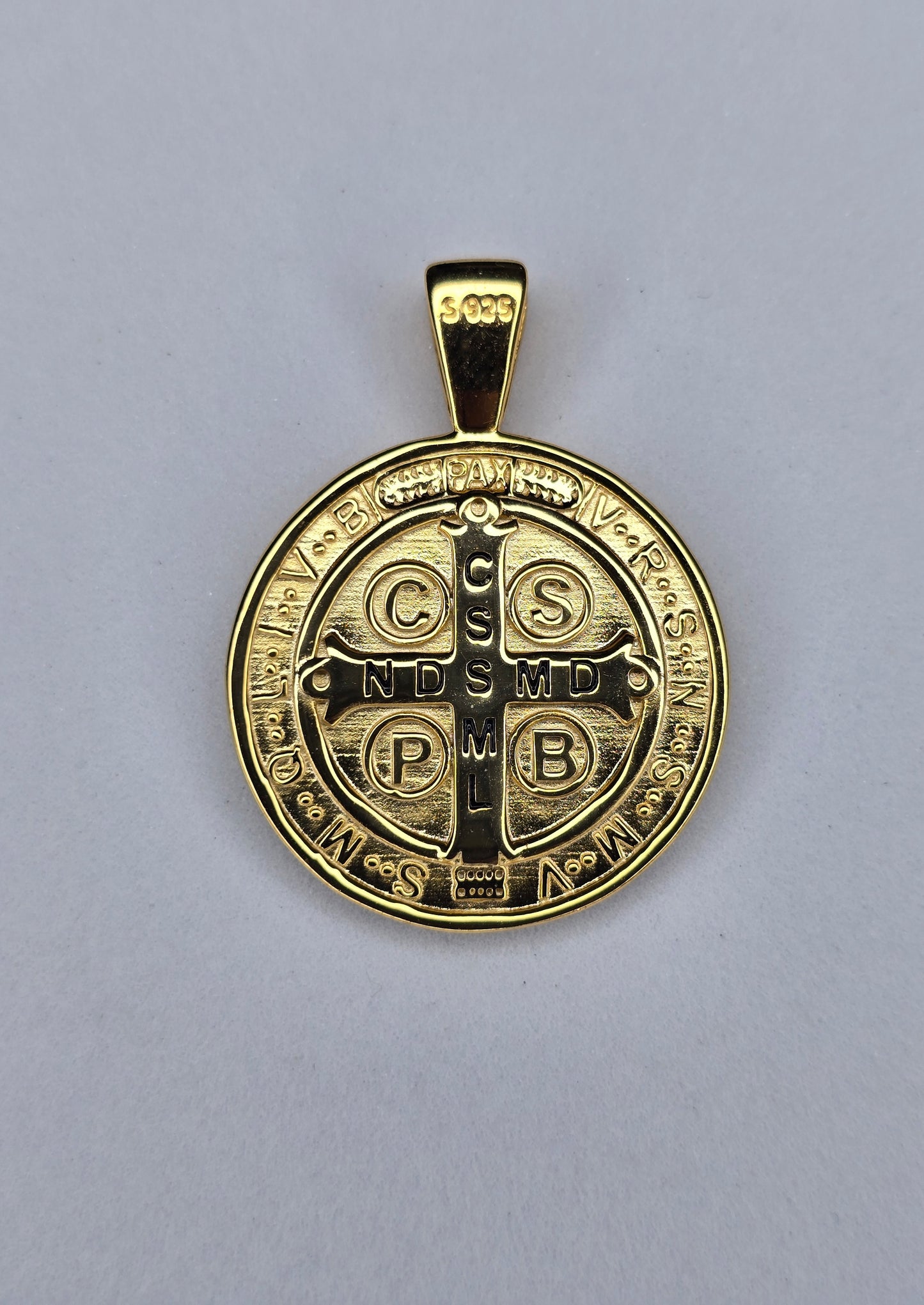 Back view of Saint Benedict medal with Benedictine cross and Latin inscriptions in gold plated silver