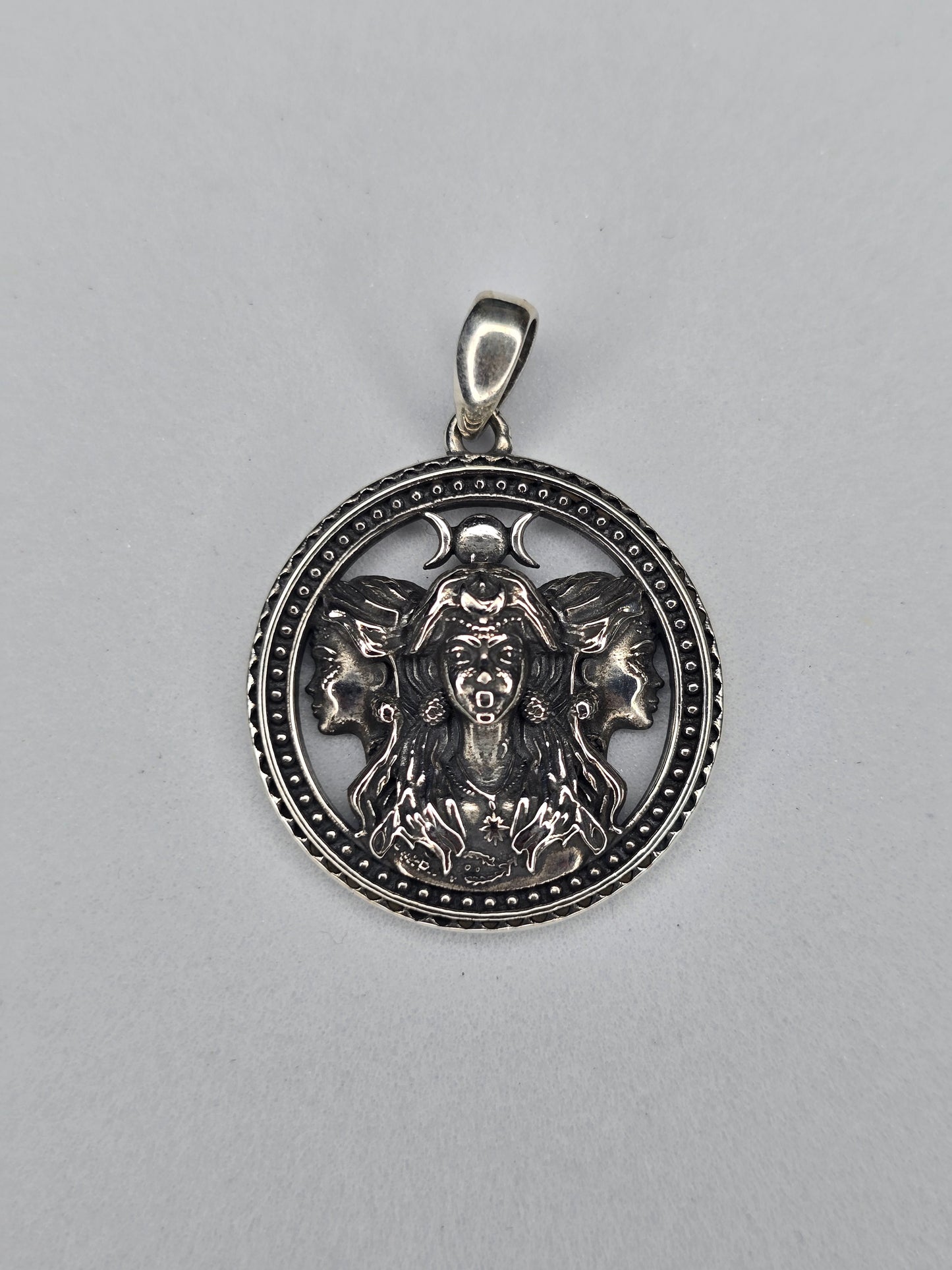 Triple Moon Goddess Hecate pendant in solid 925 sterling silver with three-faced design