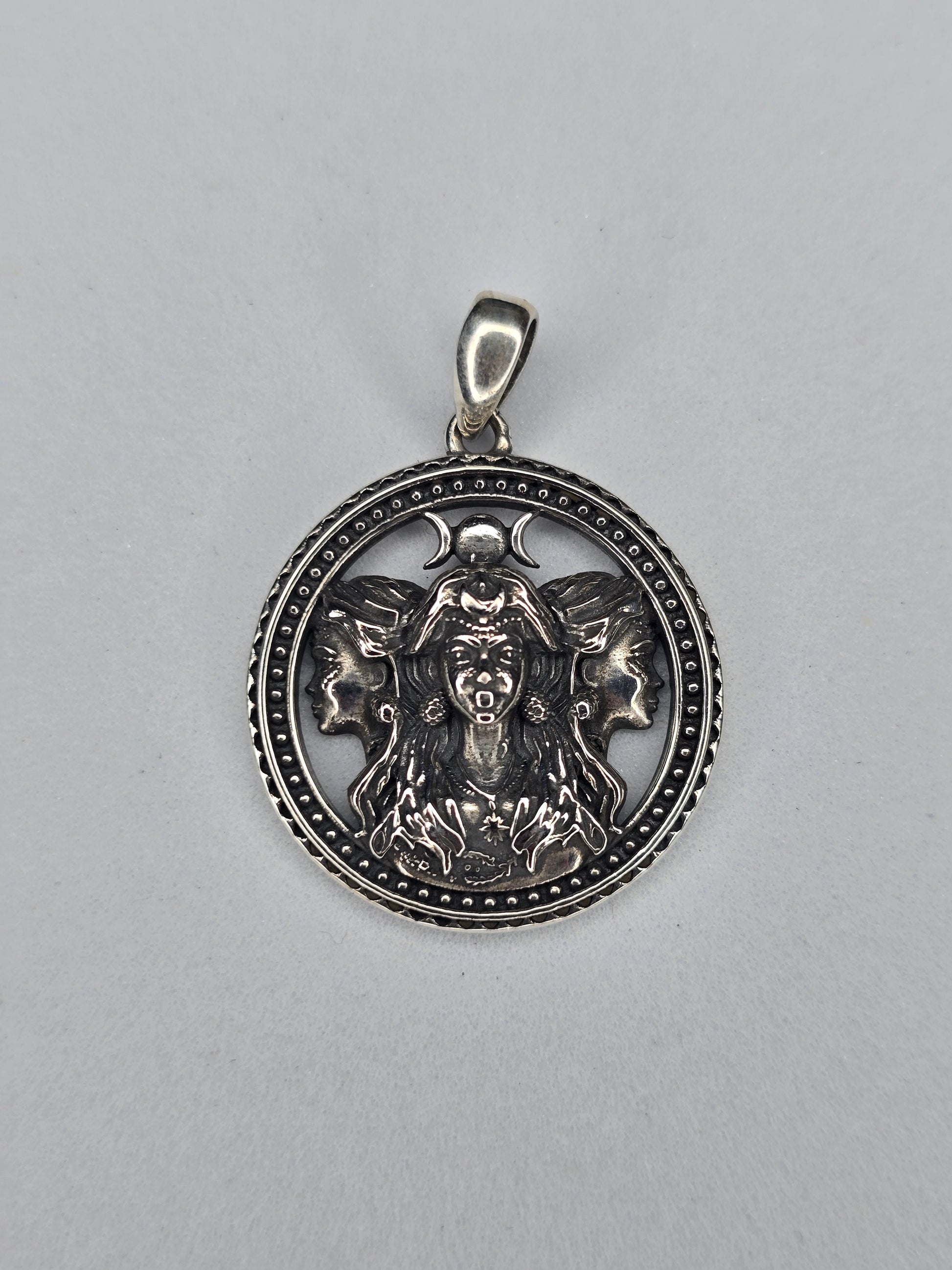 Triple Moon Goddess Hecate pendant in solid 925 sterling silver with three-faced design