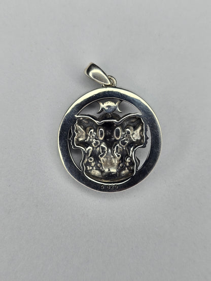 Back view of Triple Moon Goddess pendant with textured sterling silver finish