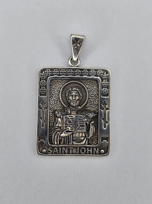 Saint John pendant in solid 925 sterling silver with engraved saint holding scripture