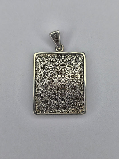 Back view of Saint John silver pendant with textured finish and S925 hallmark