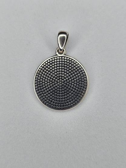 Back view of Tree of Life rune pendant with textured sterling silver surface