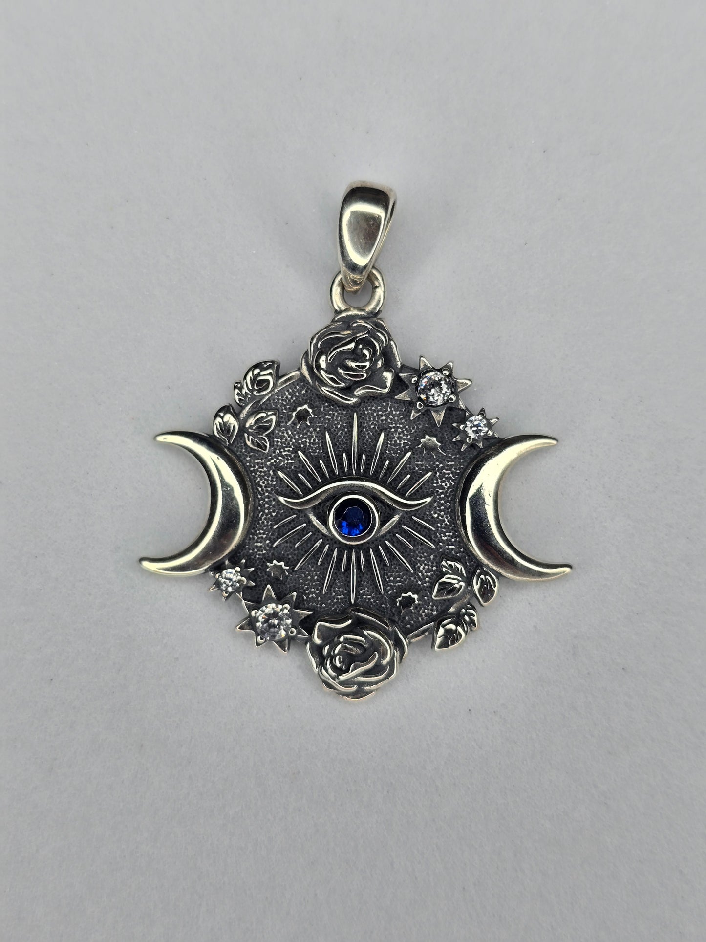 Eye of Horus triple moon goddess pendant in solid 925 sterling silver with lunar and celestial symbols