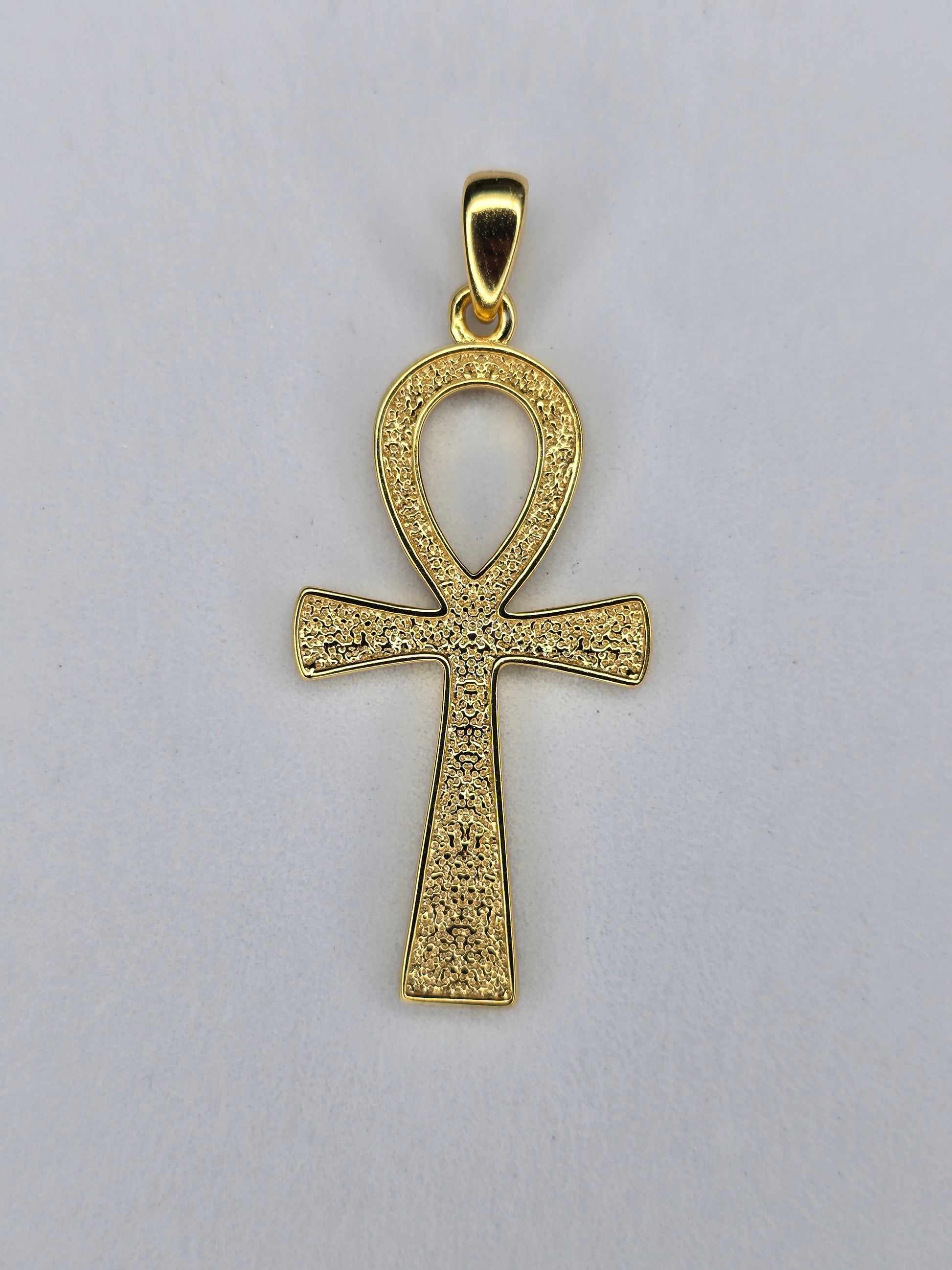 Back view of gold plated Ankh pendant with textured finish in sterling silver