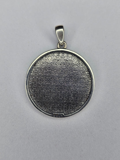 Back view of sterling silver Yin Yang dragon pendant with textured finish and 925 hallmark