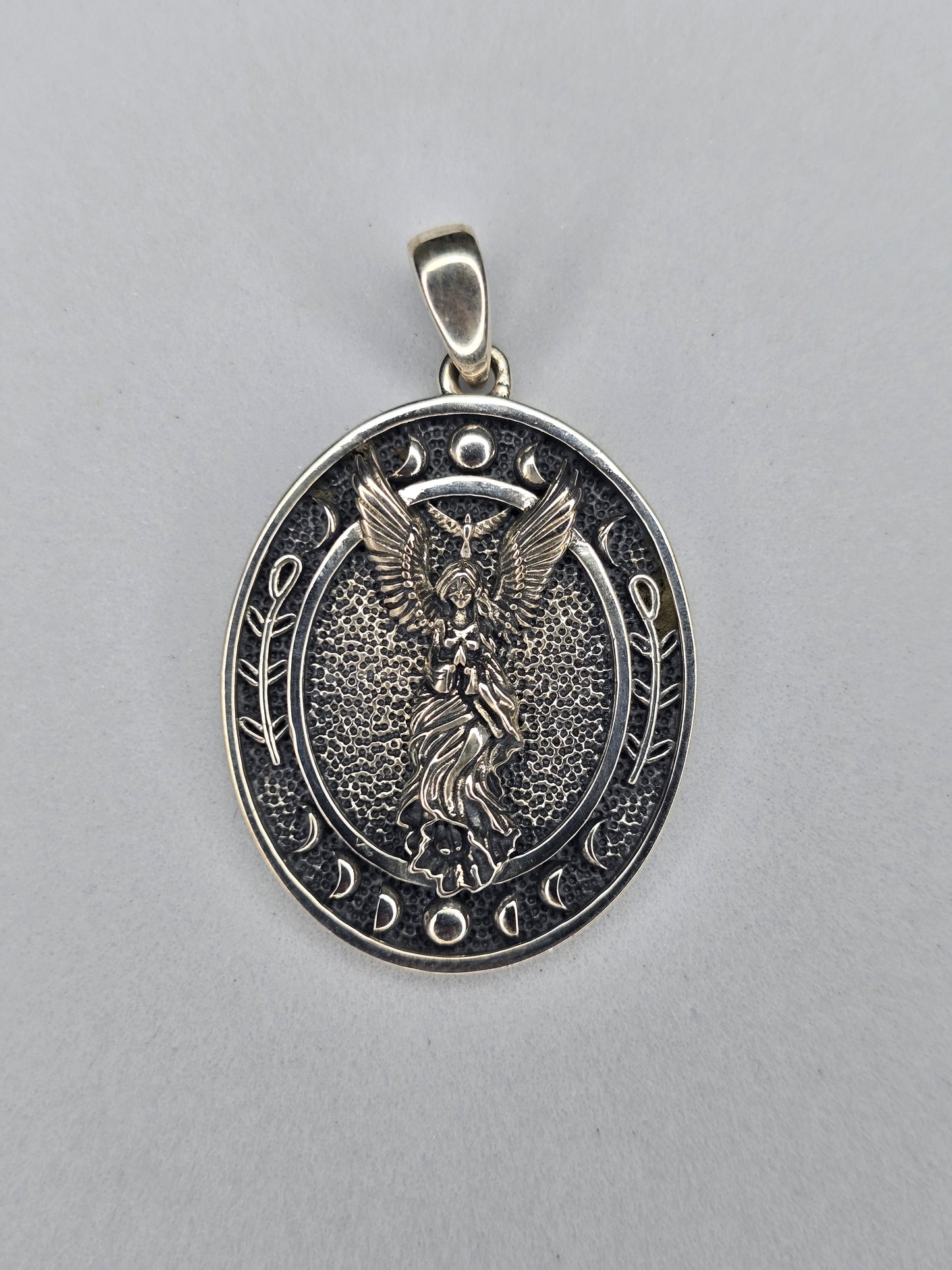 Occult angel pendant in solid 925 sterling silver with winged feminine figure and lunar symbols