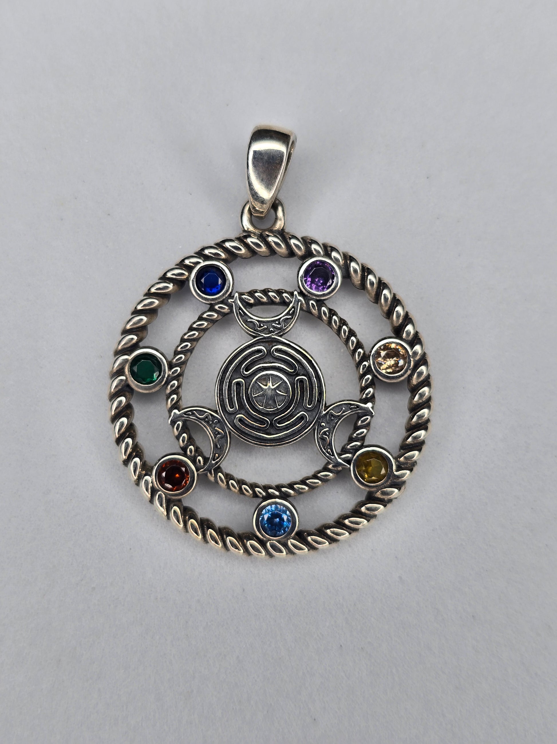 Hecate wheel pendant in solid 925 sterling silver with triple moon symbol and seven chakra stones
