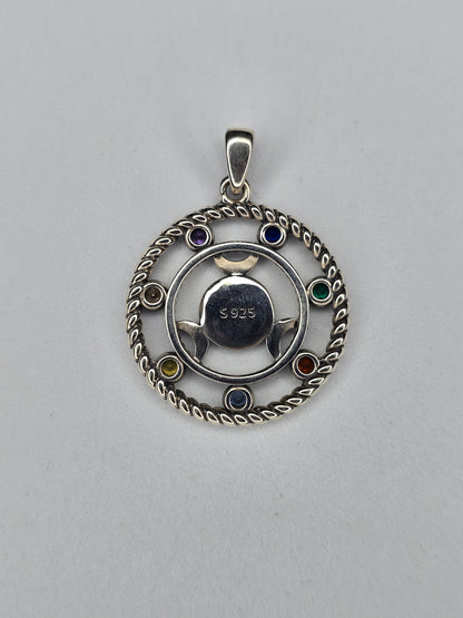 Back view of Hecate wheel pendant showing 925 sterling silver hallmark and circular triple moon design