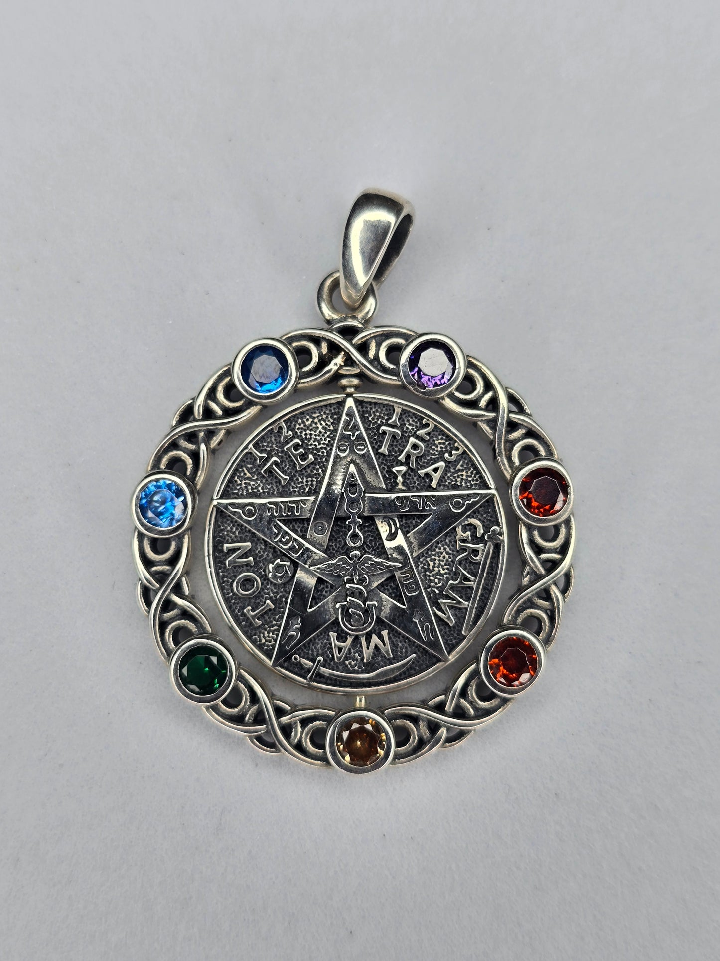 Rotatable pentagram pendant in 925 sterling silver with seven chakra stones
